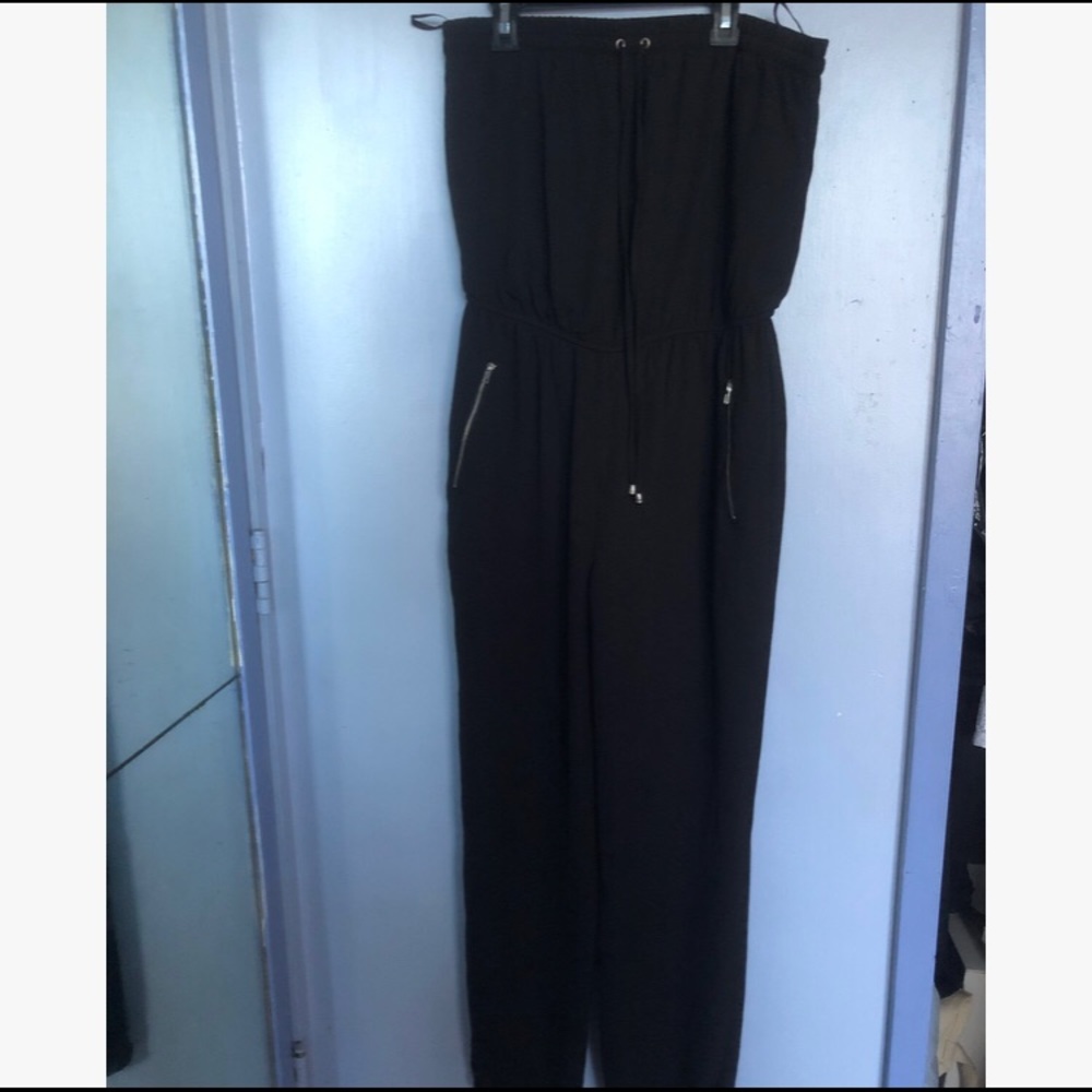 Full length, black jumpsuit